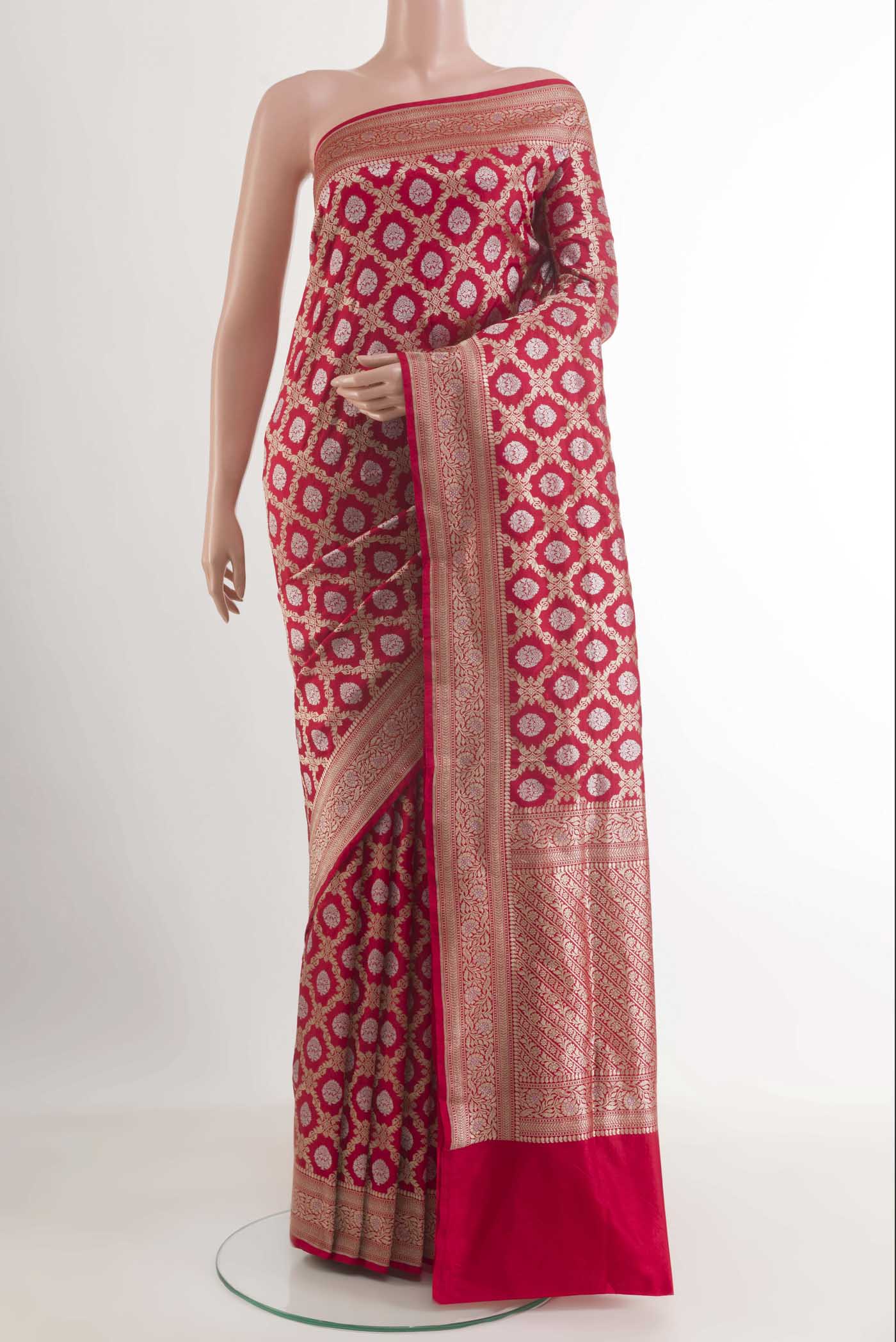 Red Banarasi Silk Saree with Zari Butta on the body and Zari Border.  displayed on a mannequin