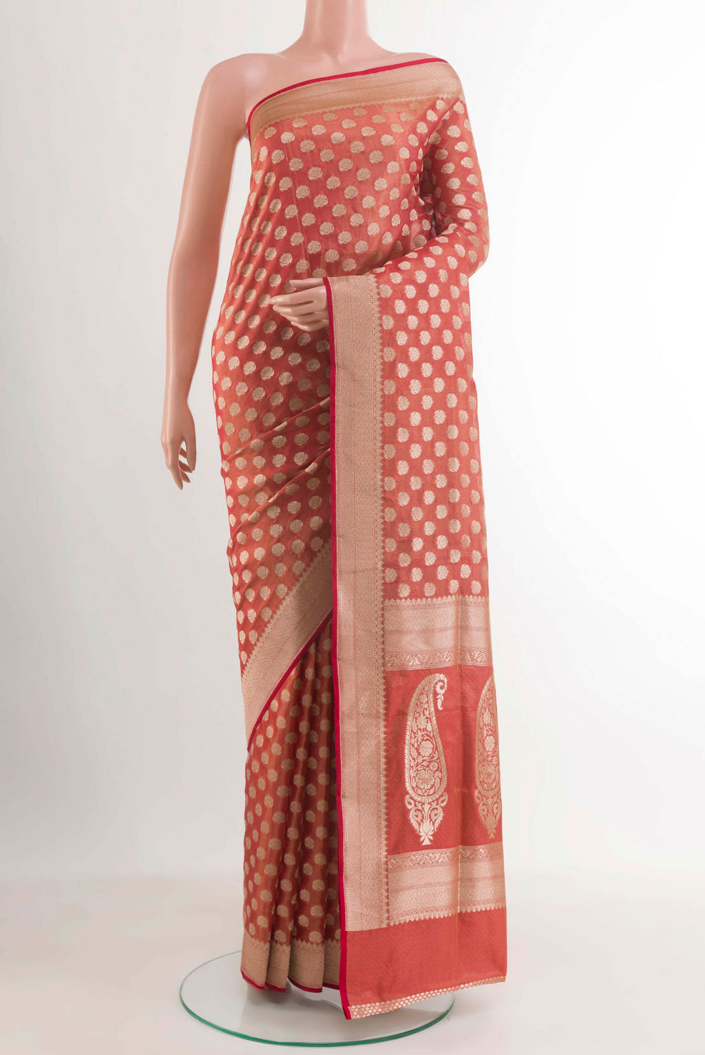 Red Banarasi Silk Saree with Zari Butta on the body and Zari Border.  displayed on a mannequin