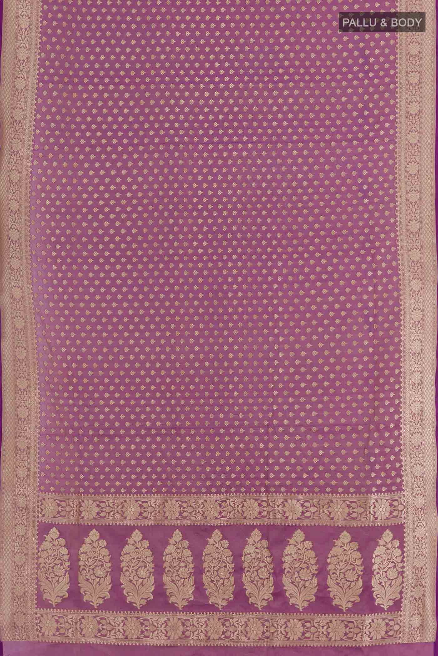 Flat view of Purple Banarasi Silk Saree with Zari Butta on the body and Zari Border. 