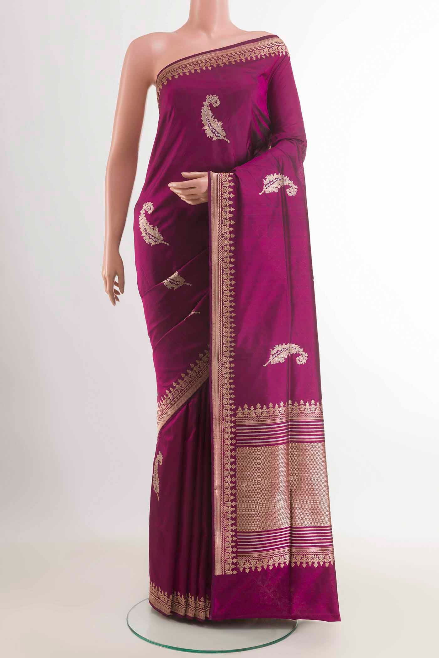 Purple Banarasi Silk Saree with Zari Butta on the body and Zari Border displayed on a mannequin
