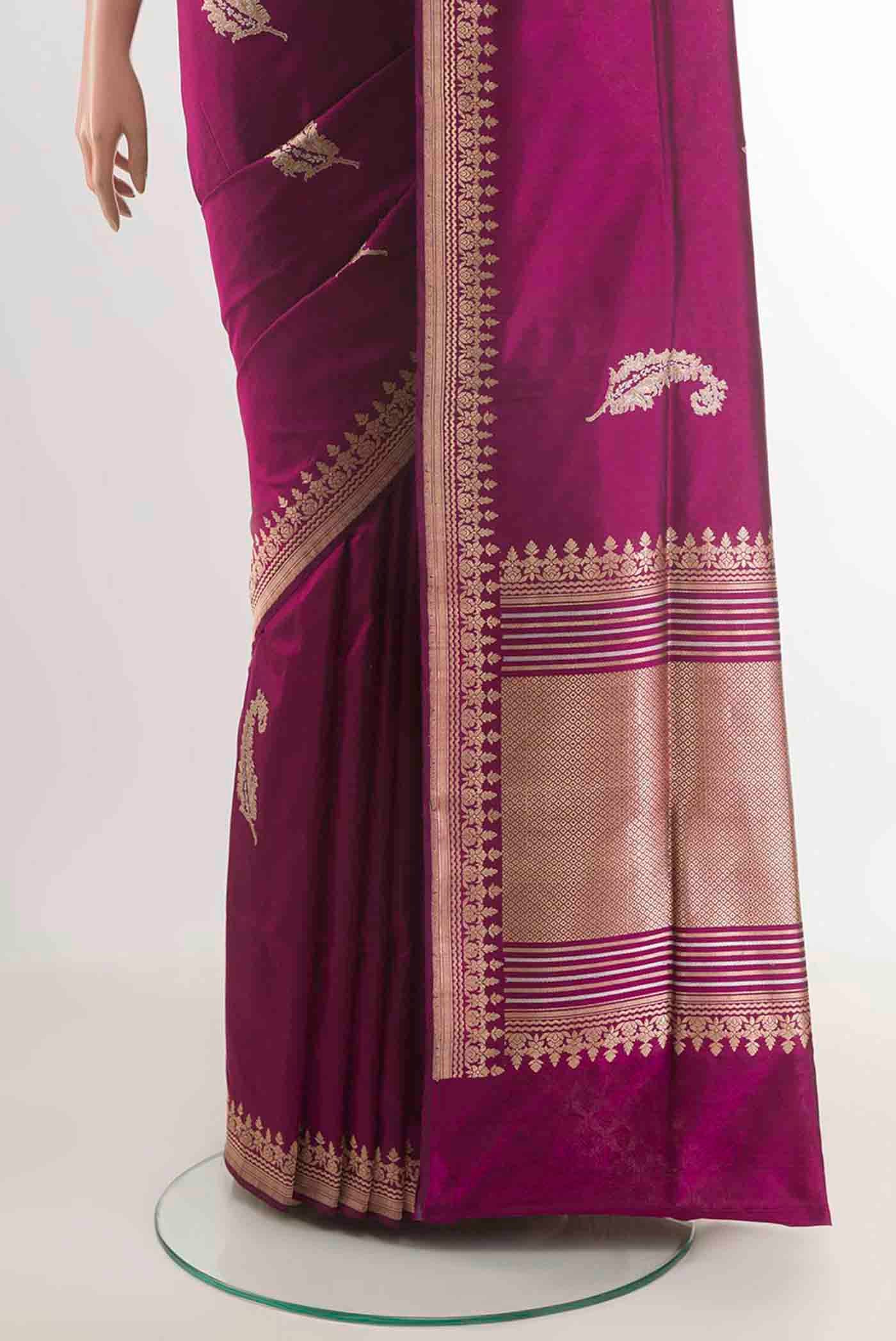 Pleats and pallu of Purple Banarasi Silk Saree with Zari Butta on the body and Zari Border