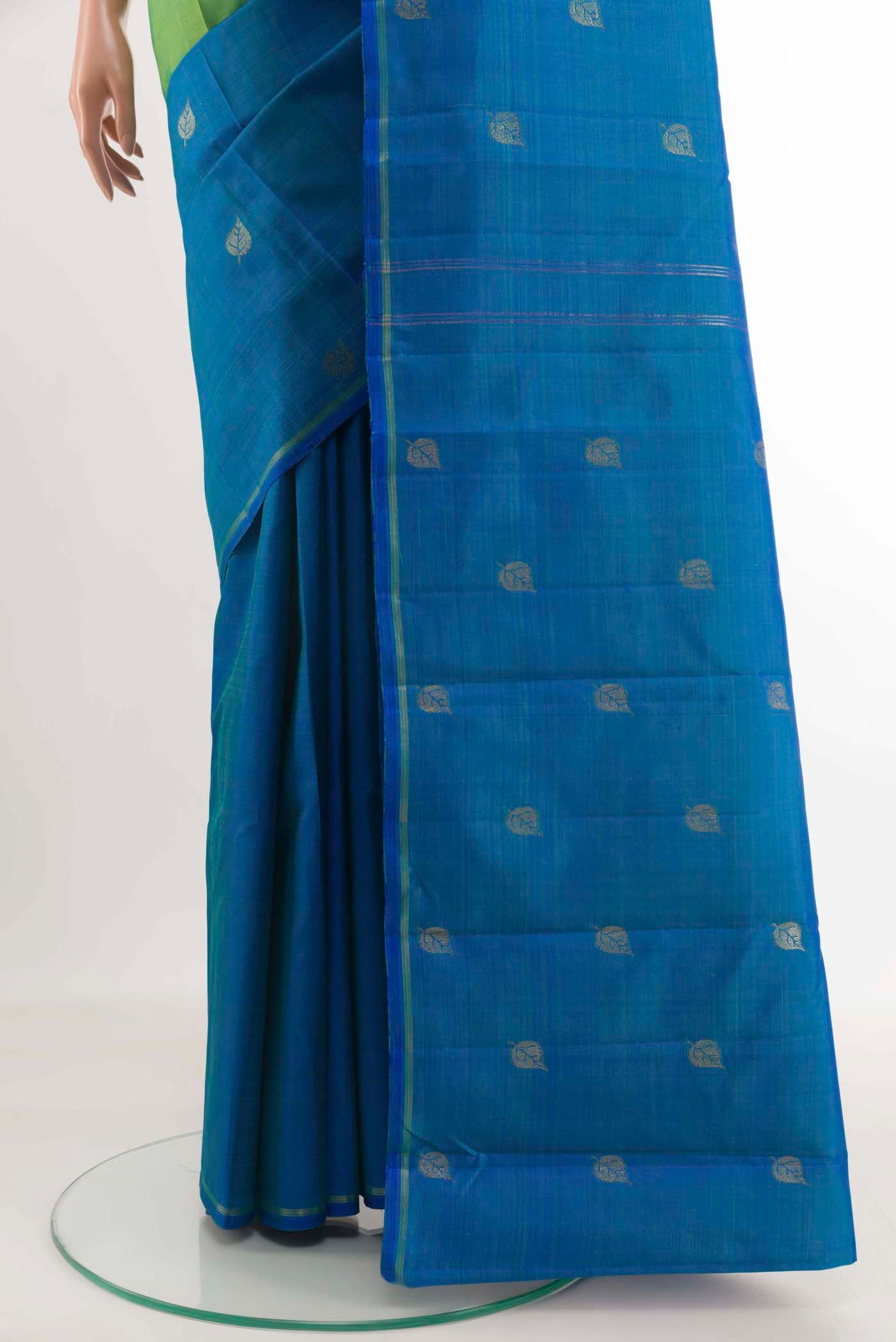 Pleats and pallu of Blue Kanjivaram Silk Saree with Half And Half on the body and Rising Temple Border. 