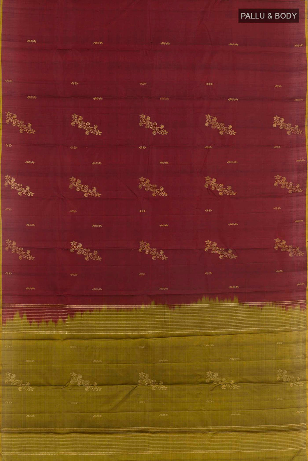 Flat view of Maroon Kanchipuram Silk Saree with Zari Butta on the body and Zari Border. 