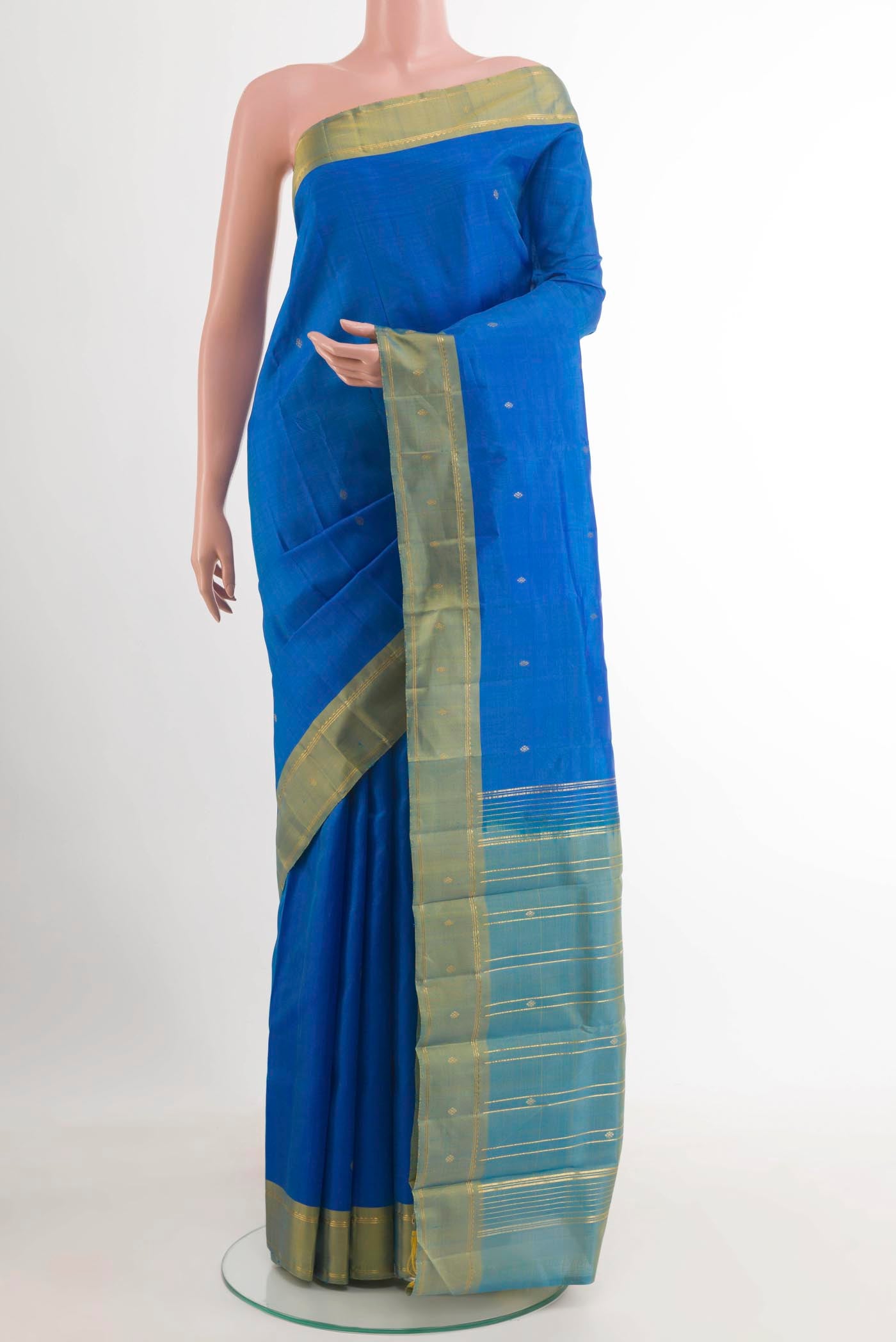 Blue Kanchipuram Silk Saree with Zari Butta on the body and Zari Border.  displayed on a mannequin