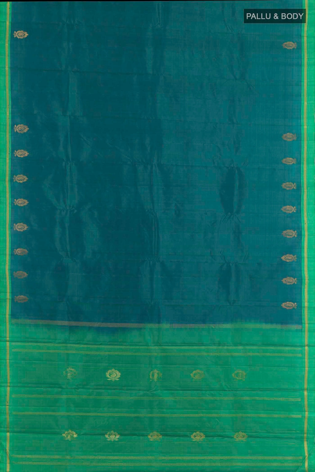 Flat view of Peacock Blue Dual Tone Kanchipuram Silk Saree with Zari Butta on the body and Zari Border. 