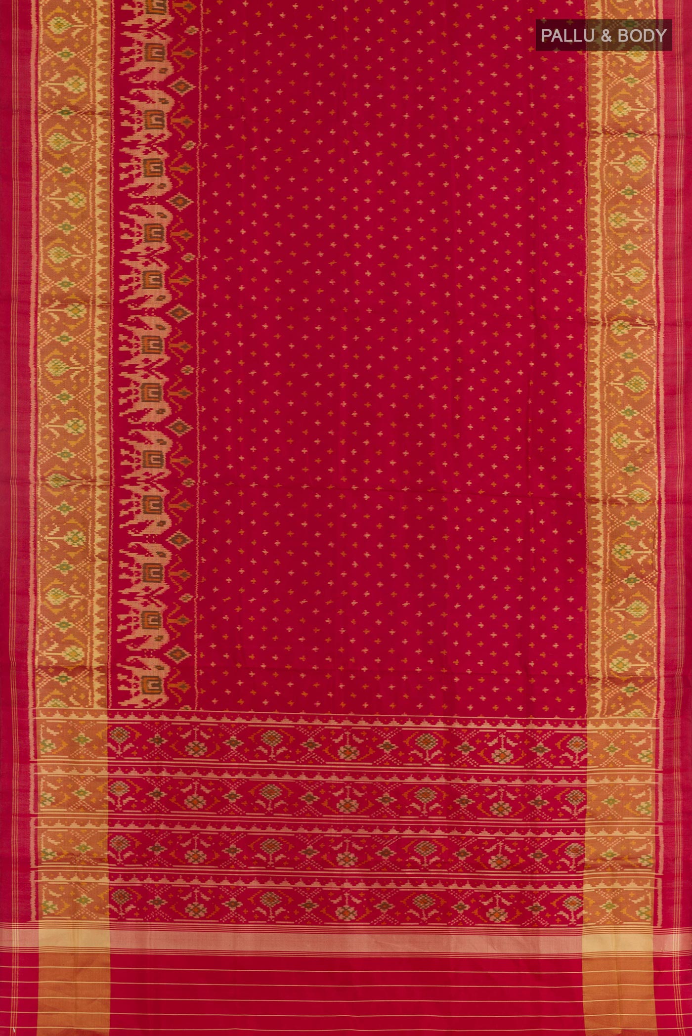 Flat view of Red Rajkot Patola Silk Saree with Ikat design on the body and Zari Border. 