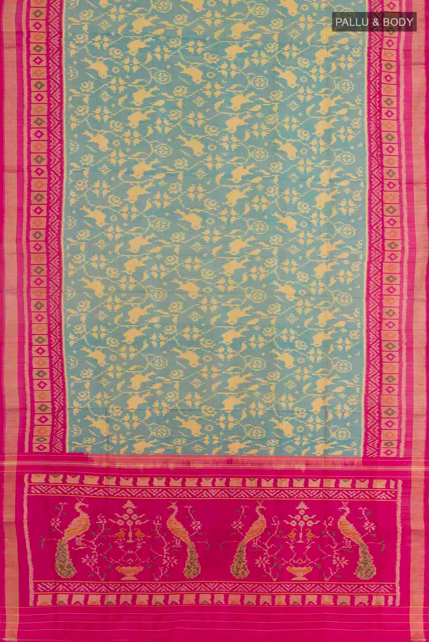 Flat view of Teal Rajkot Patola Silk Saree with Pure Ikat on the body and Zari Border. 