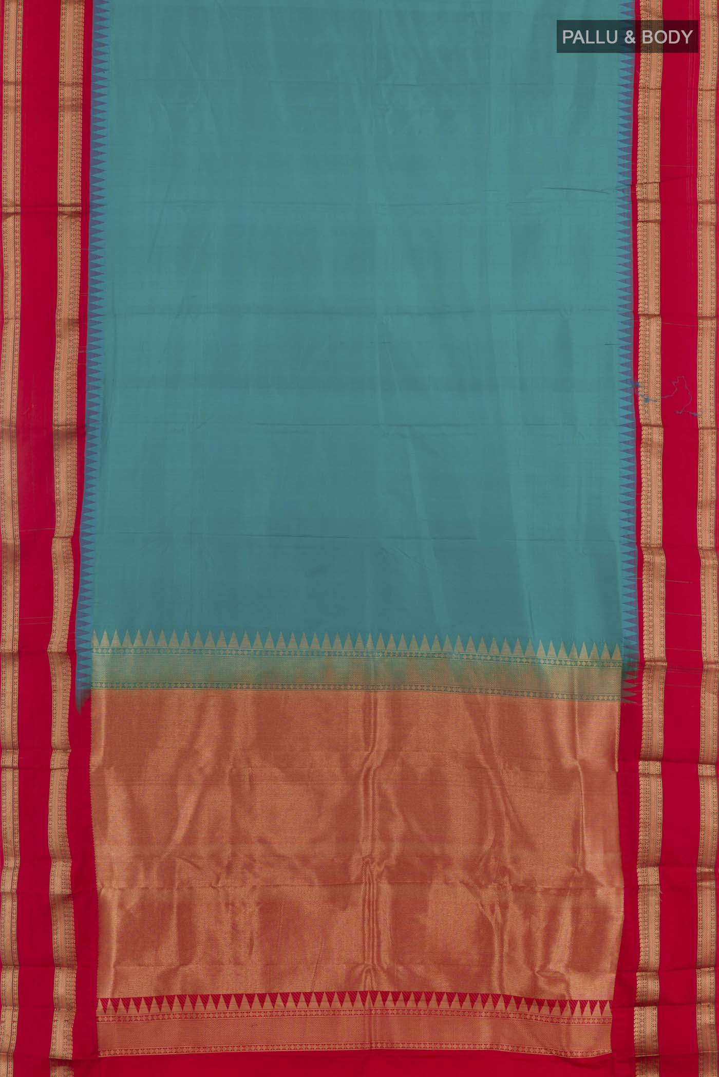 Flat view of Blue Kanjivaram Silk Saree with Plain Body and Zari Border. 