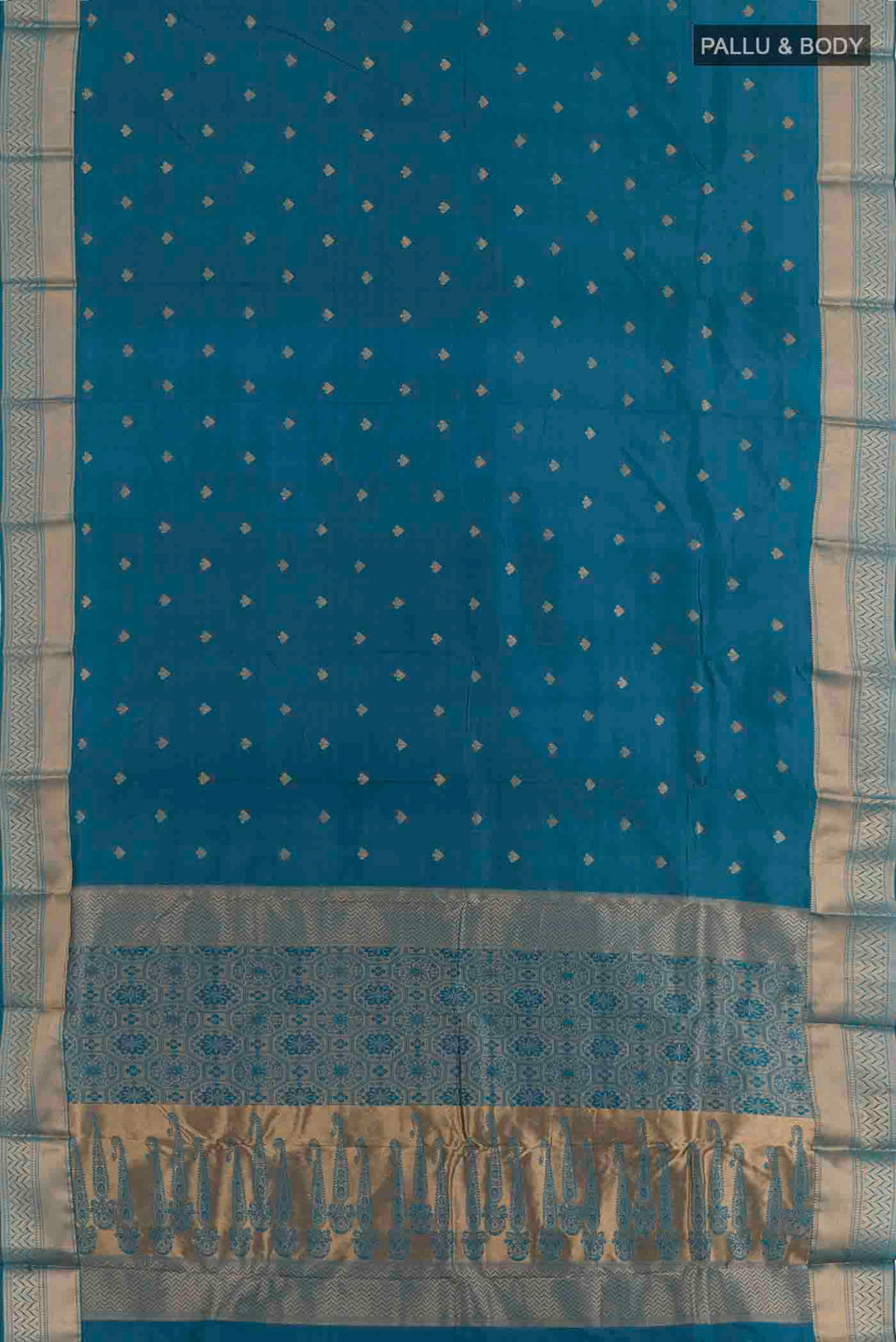 Flat view of Royal Blue Kanjivaram Silk Saree with Zari Butta on the body and Zari Border. 
