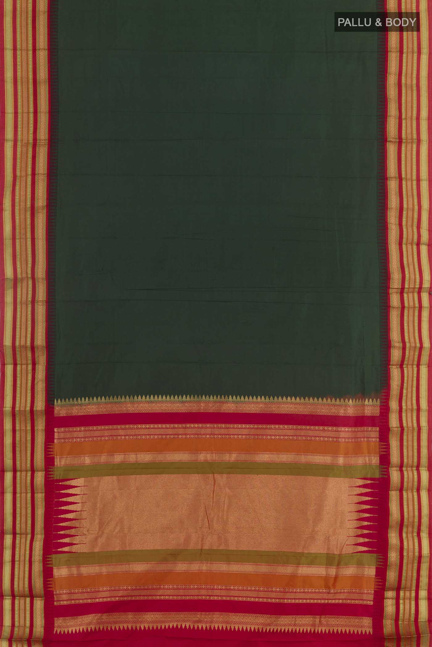 Flat view of Bottle Green Kanjivaram Silk Saree with Zari Butta on the body and Zari Border. 