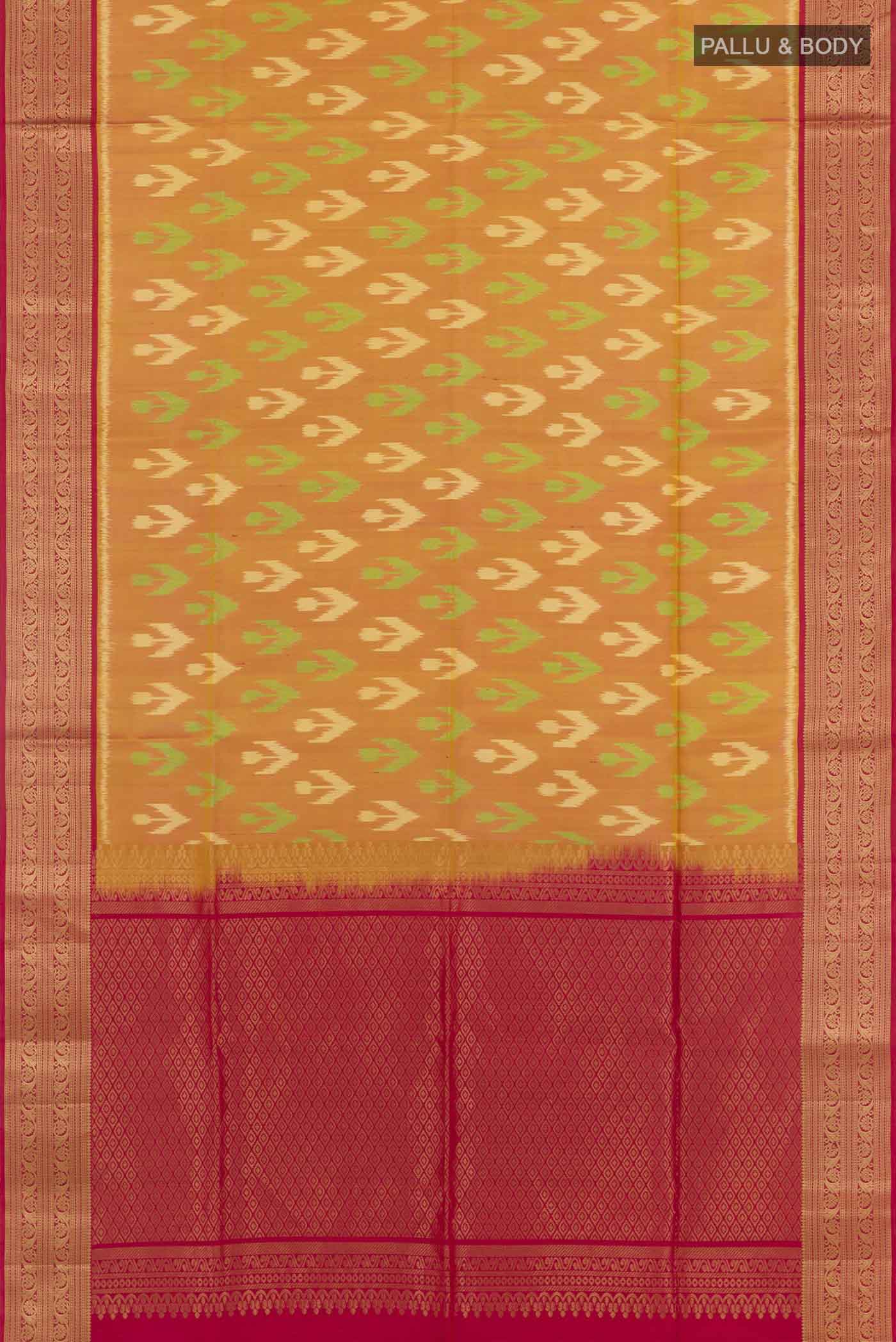 Flat view of Peach Soft Silk Saree with Ikat design on the body and Zari Border. 