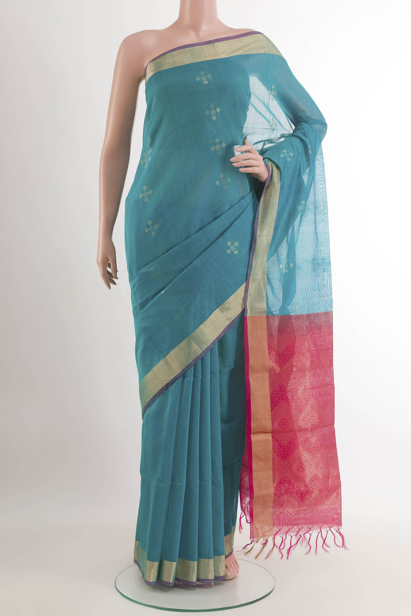 Blue Blended Chanderi Kora Silk Saree with Zari Butta on the body and Zari Border.  displayed on a mannequin