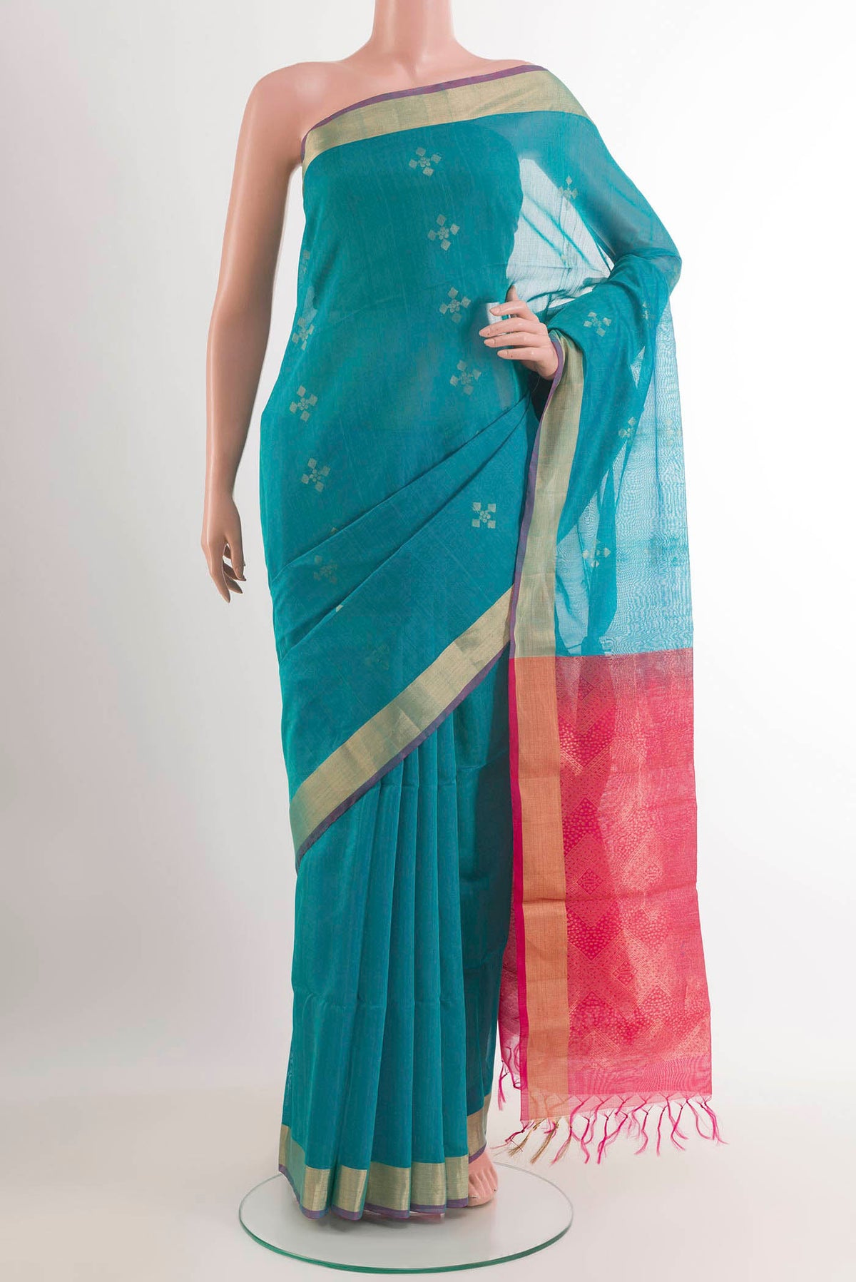 Blue Blended Chanderi Kora Silk Saree with Zari Butta on the body and Zari Border.  displayed on a mannequin