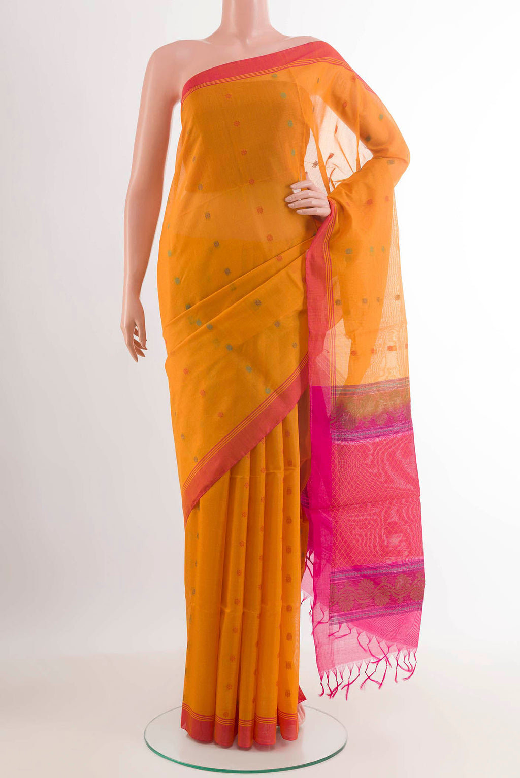Yellow Blended Kora Cotton Saree with Thread Butta on the body and Zari Border.  displayed on a mannequin