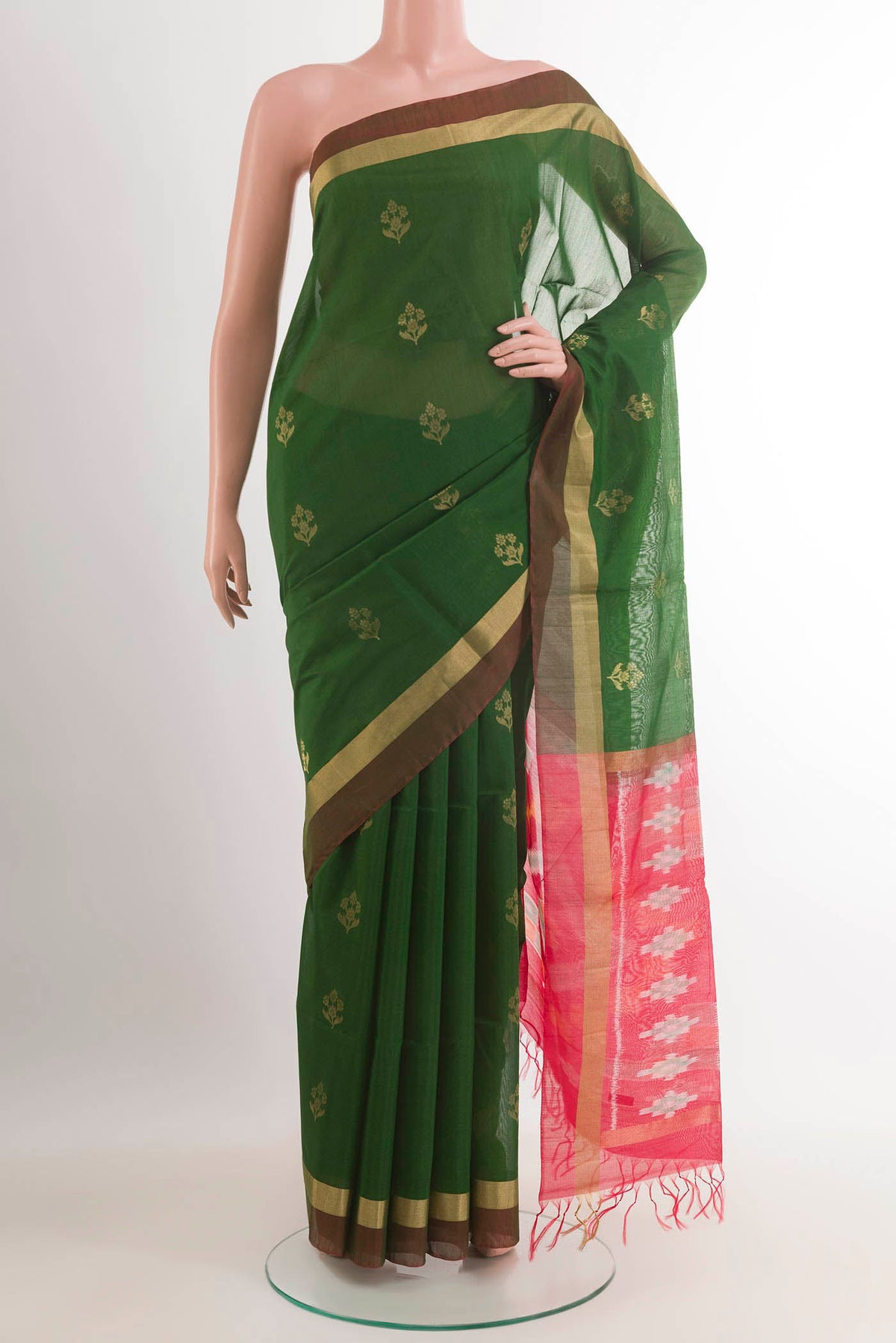 Green Dual Tone Blended Kora Cotton Saree with Zari Butta on the body and Zari Border.  displayed on a mannequin