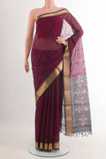 Purple Blended Kora Cotton Saree with Zari Butta on the body and Zari Border.  displayed on a mannequin