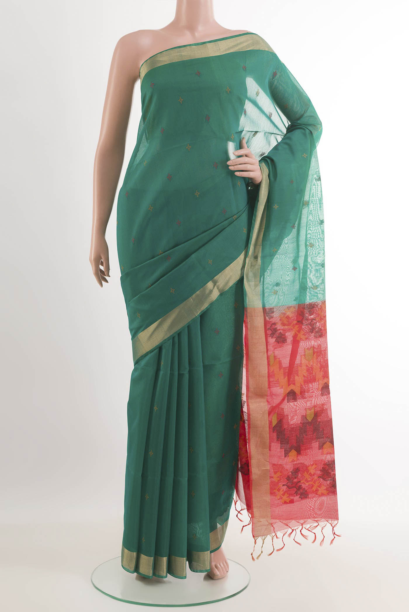 Green Blended Kota Cotton Saree with Zari Butta on the body and Zari Border.  displayed on a mannequin