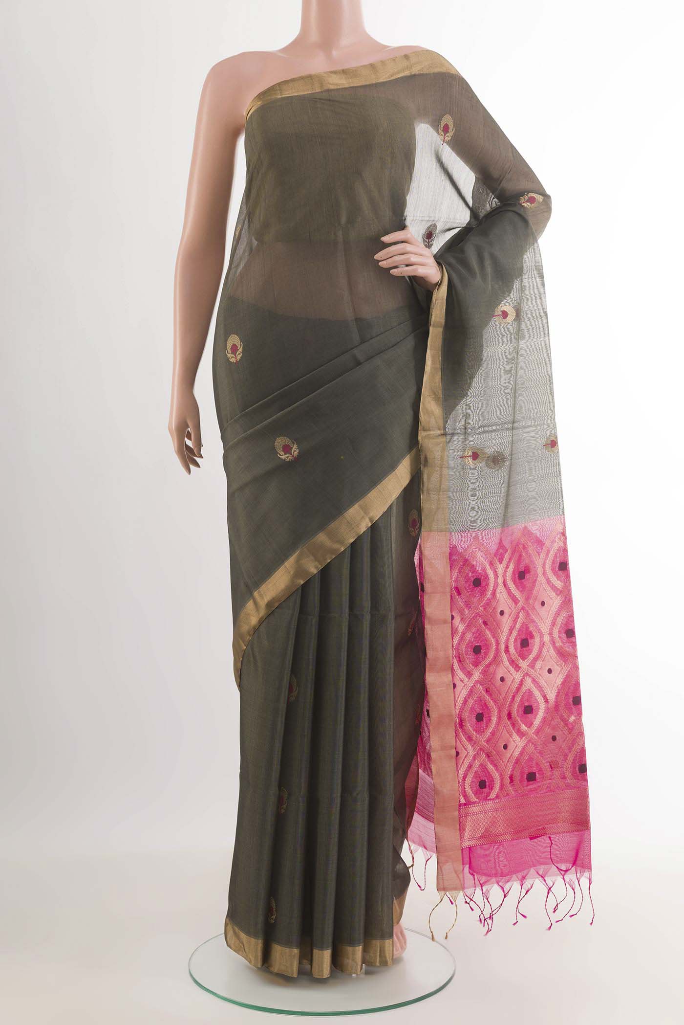 Grey Blended Kora Cotton Saree with Zari Butta on the body and Zari Border.  displayed on a mannequin
