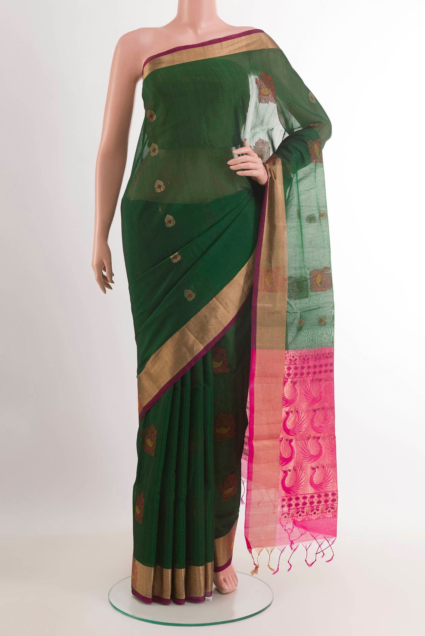 Green Blended Chanderi Kora Silk Saree with Zari Butta on the body and Zari Border.  displayed on a mannequin