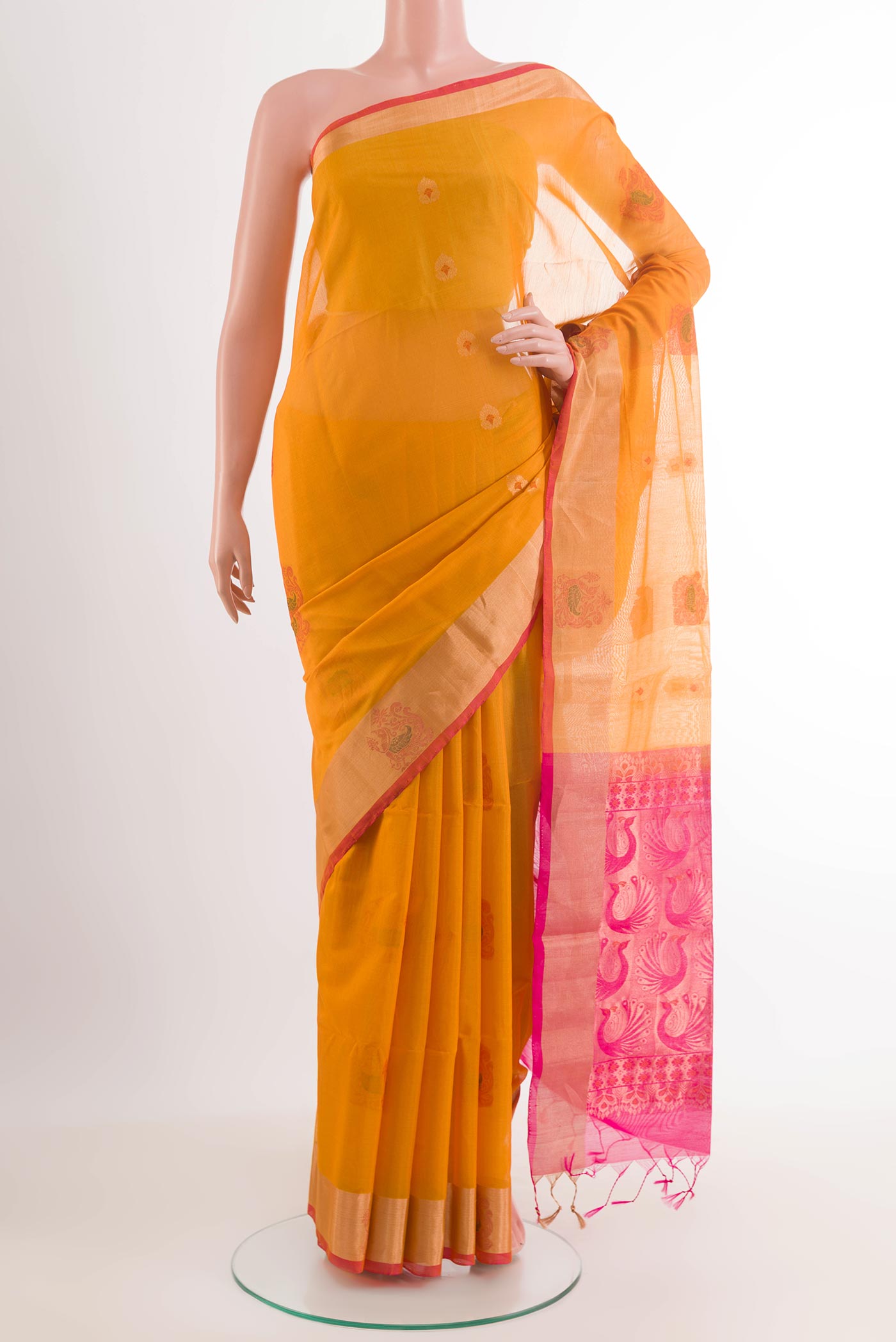 Yellow Blended Kora Cotton Saree with Zari Butta on the body and Zari Border.  displayed on a mannequin