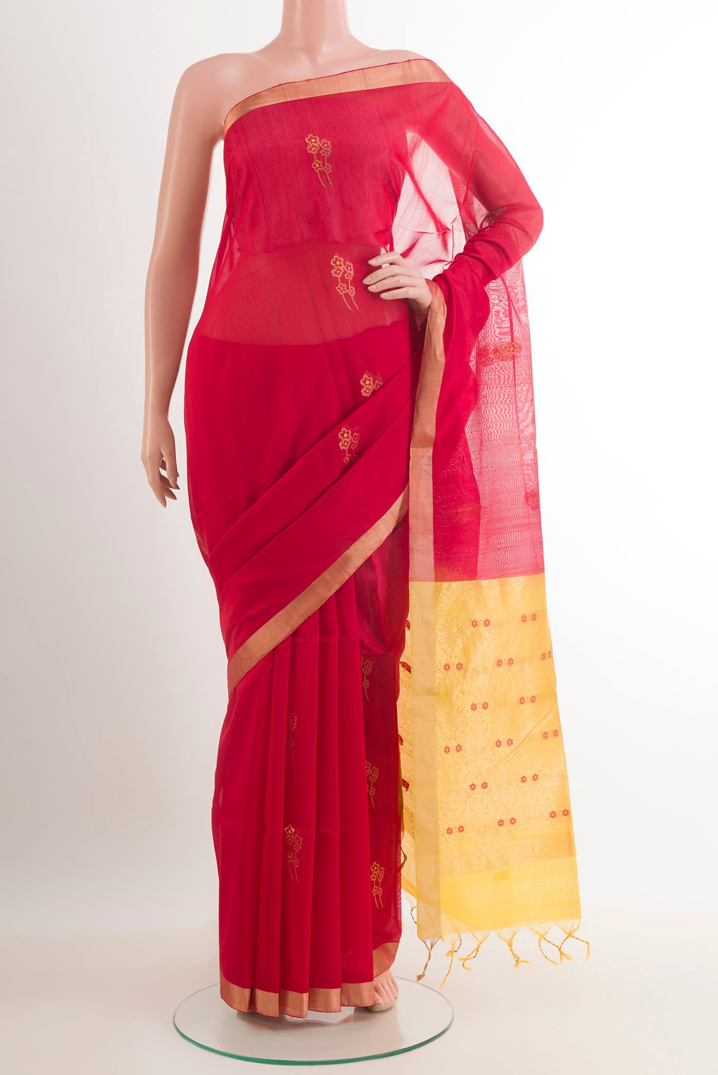 Red Kora Cotton Saree with Zari Butta on the body and Zari Border.  displayed on a mannequin