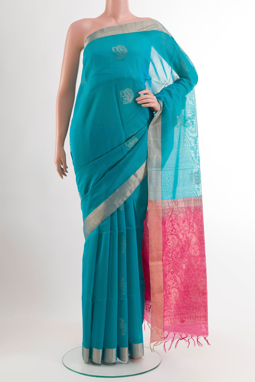 Blue Blended Kora Cotton Saree with Zari Butta on the body and Zari Border.  displayed on a mannequin