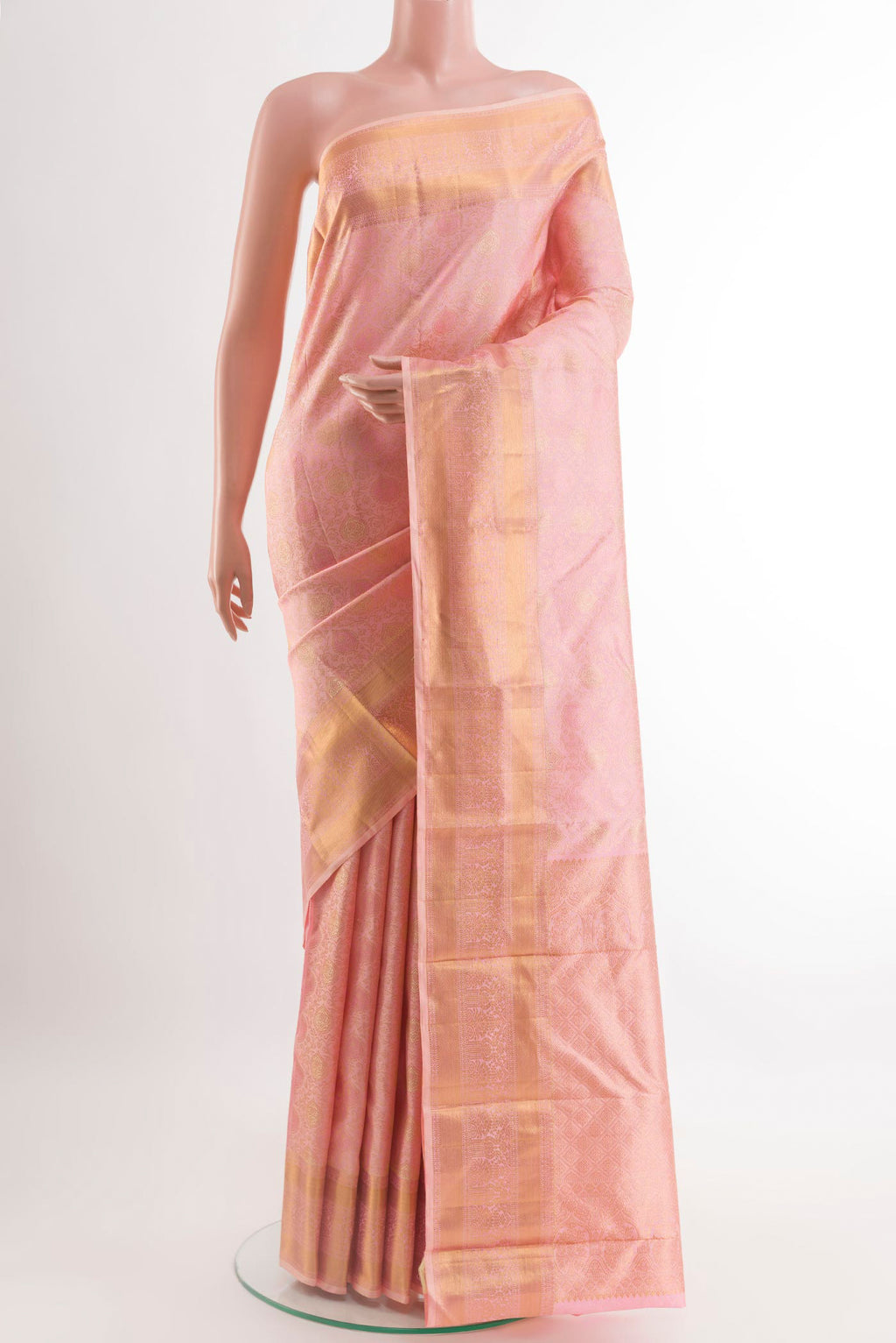 Pink Kanchipuram Silk Saree with Zari Brocade on the body and Zari Border.  displayed on a mannequin