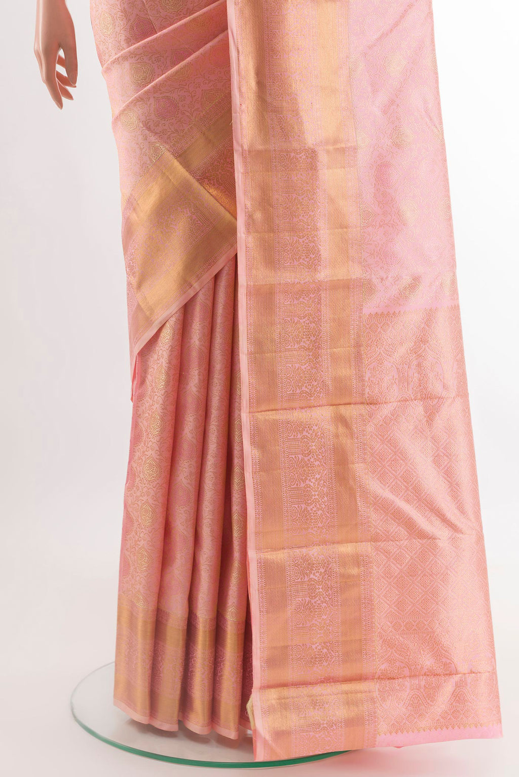 Pleats and pallu of Pink Kanchipuram Silk Saree with Zari Brocade on the body and Zari Border. 