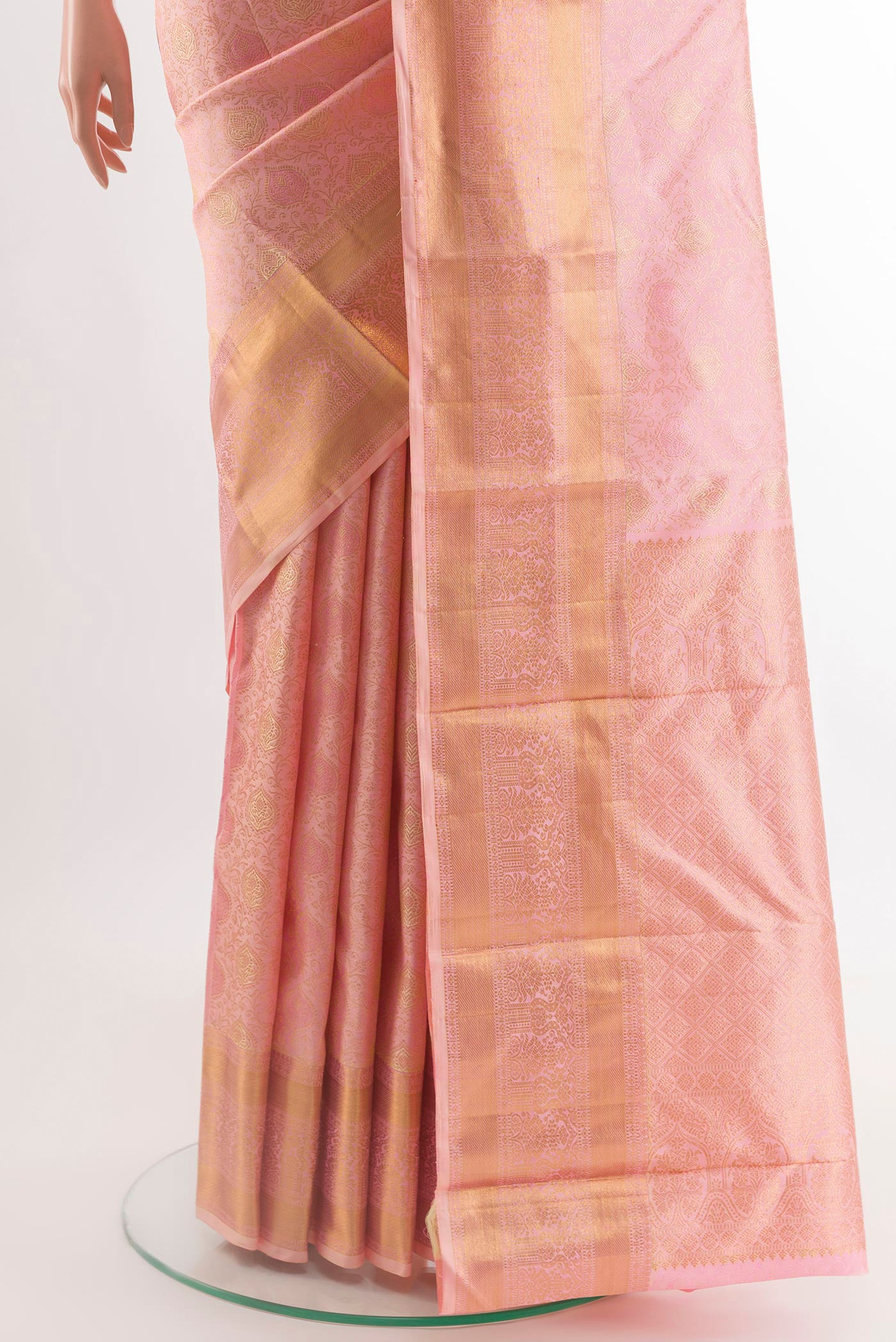 Pleats and pallu of Pink Kanchipuram Silk Saree with Zari Brocade on the body and Zari Border. 