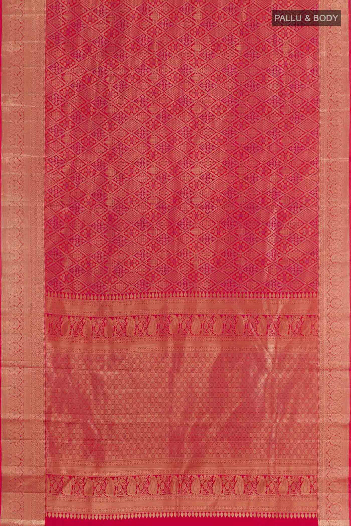 Flat view of Red Kanchipuram Silk Saree with Zari Brocade on the body and Zari Border. 