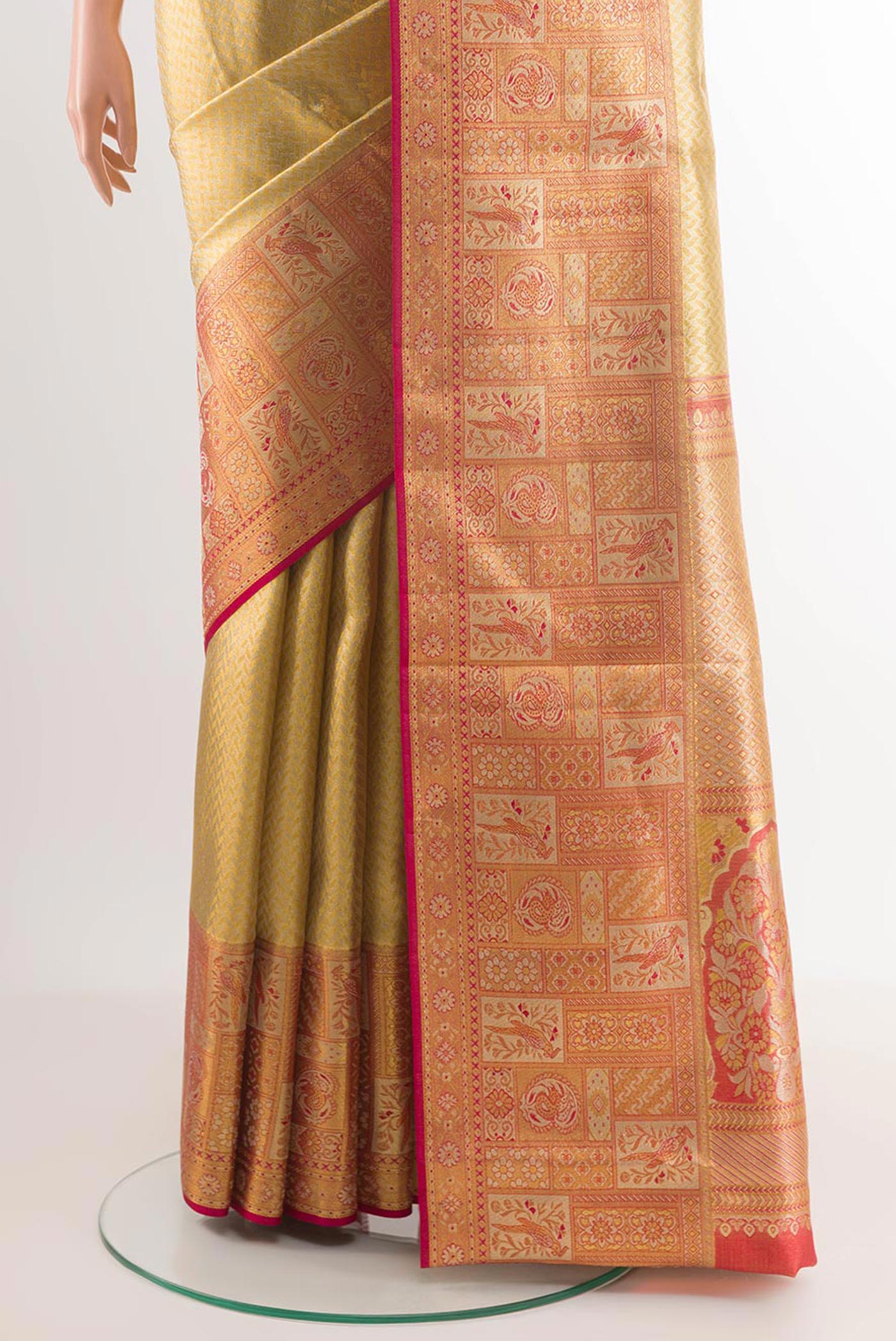 Pleats and pallu of Golden Kanchipuram Silk Saree with Zari Brocade on the body and Plain Border. 