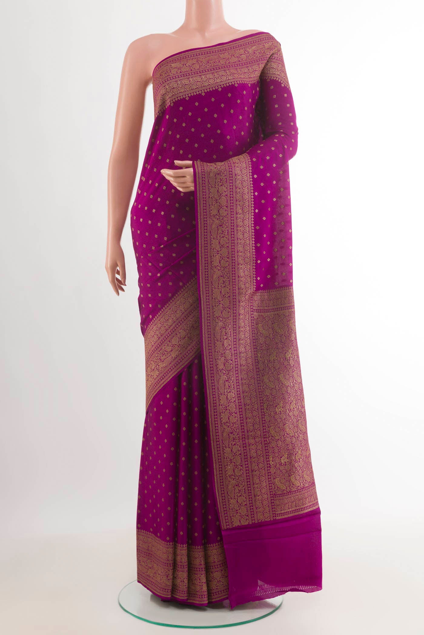 Purple Banarasi Georgette Saree with Zari Butta on the body and Zari Border.  displayed on a mannequin