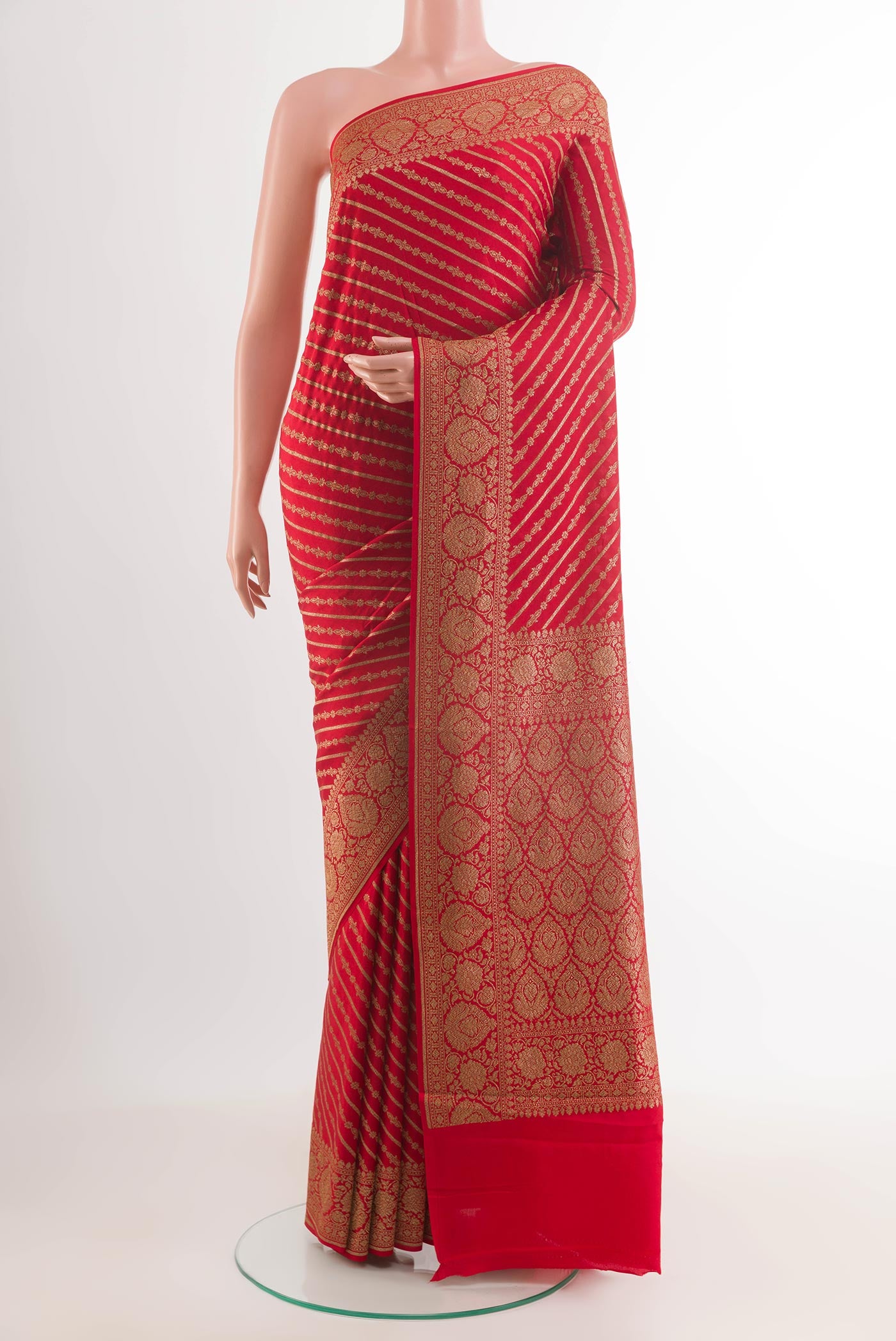 Red Banarasi Georgette Saree with Stripes on the body and Plain Border.  displayed on a mannequin