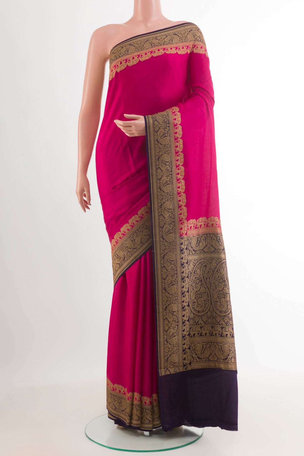 Pink Banarasi Georgette Saree with Plain Body and Zari Border.  displayed on a mannequin