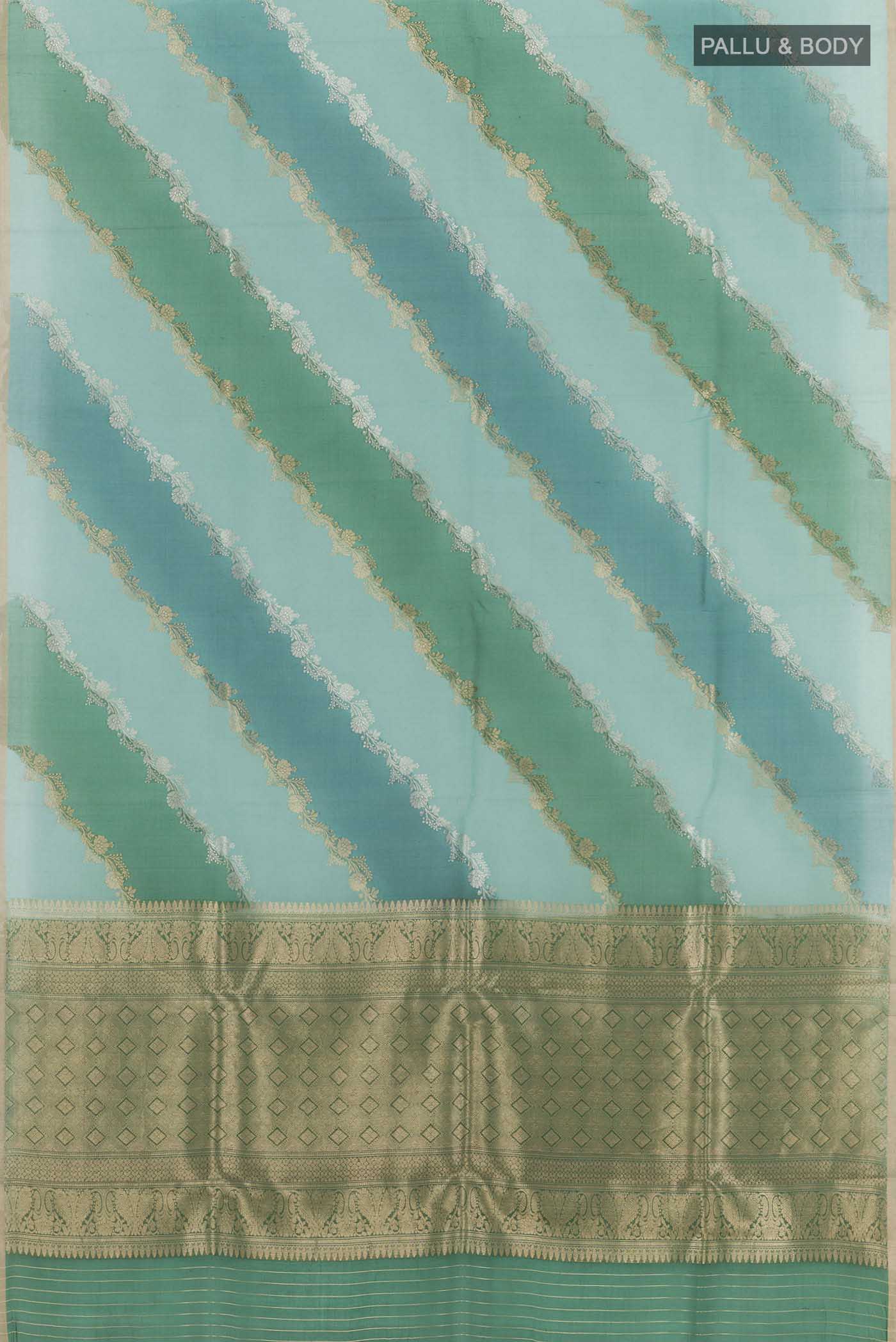 Flat view of Blue Banarasi Kora Silk Saree with Zari Butta on the body and Plain Border. 