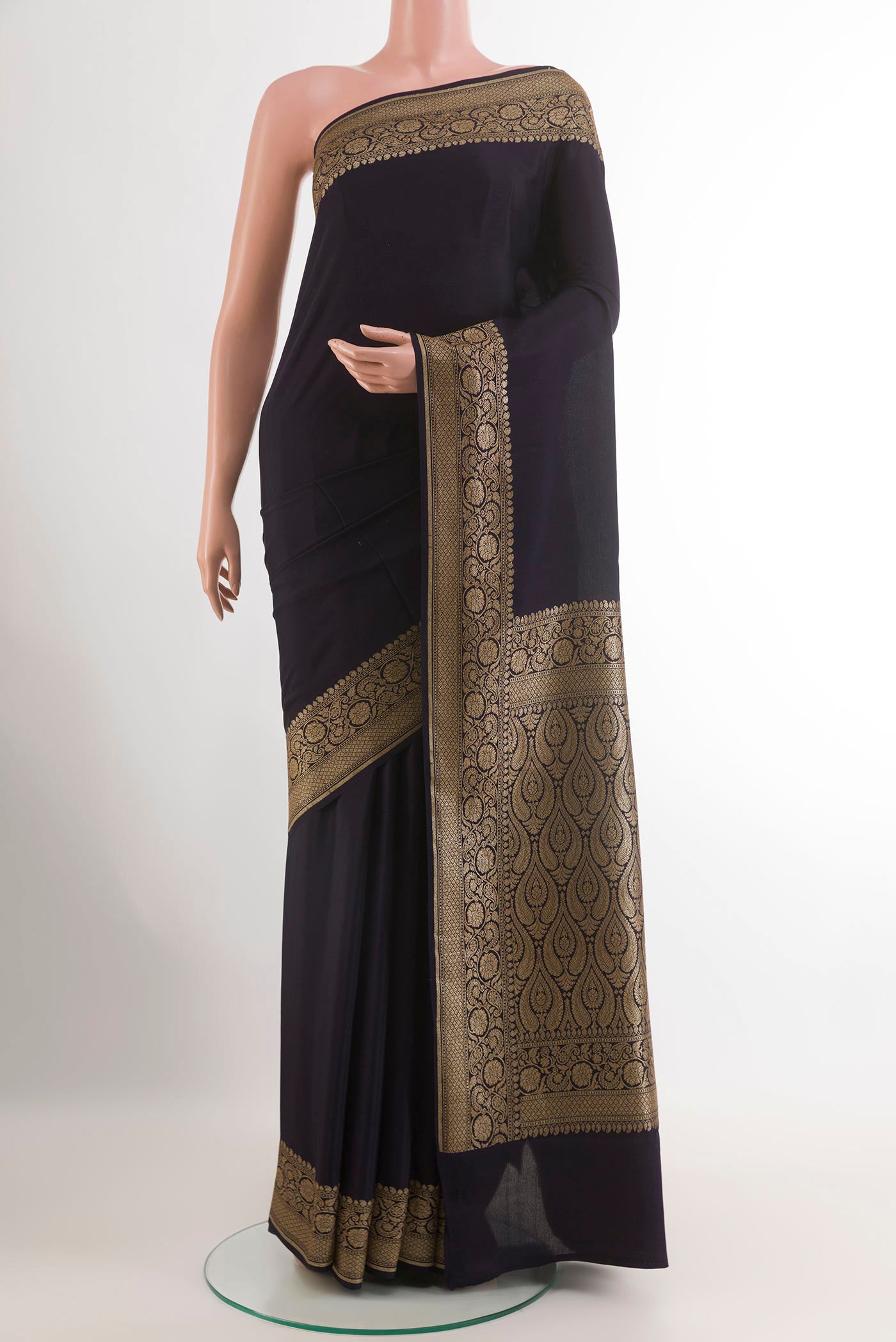 Dark Blue Crepe Saree with Plain Body and Zari Border.  displayed on a mannequin