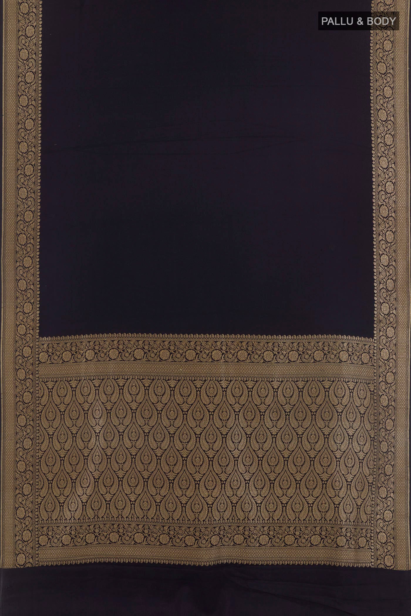 Flat view of Dark Blue Crepe Saree with Plain Body and Zari Border. 