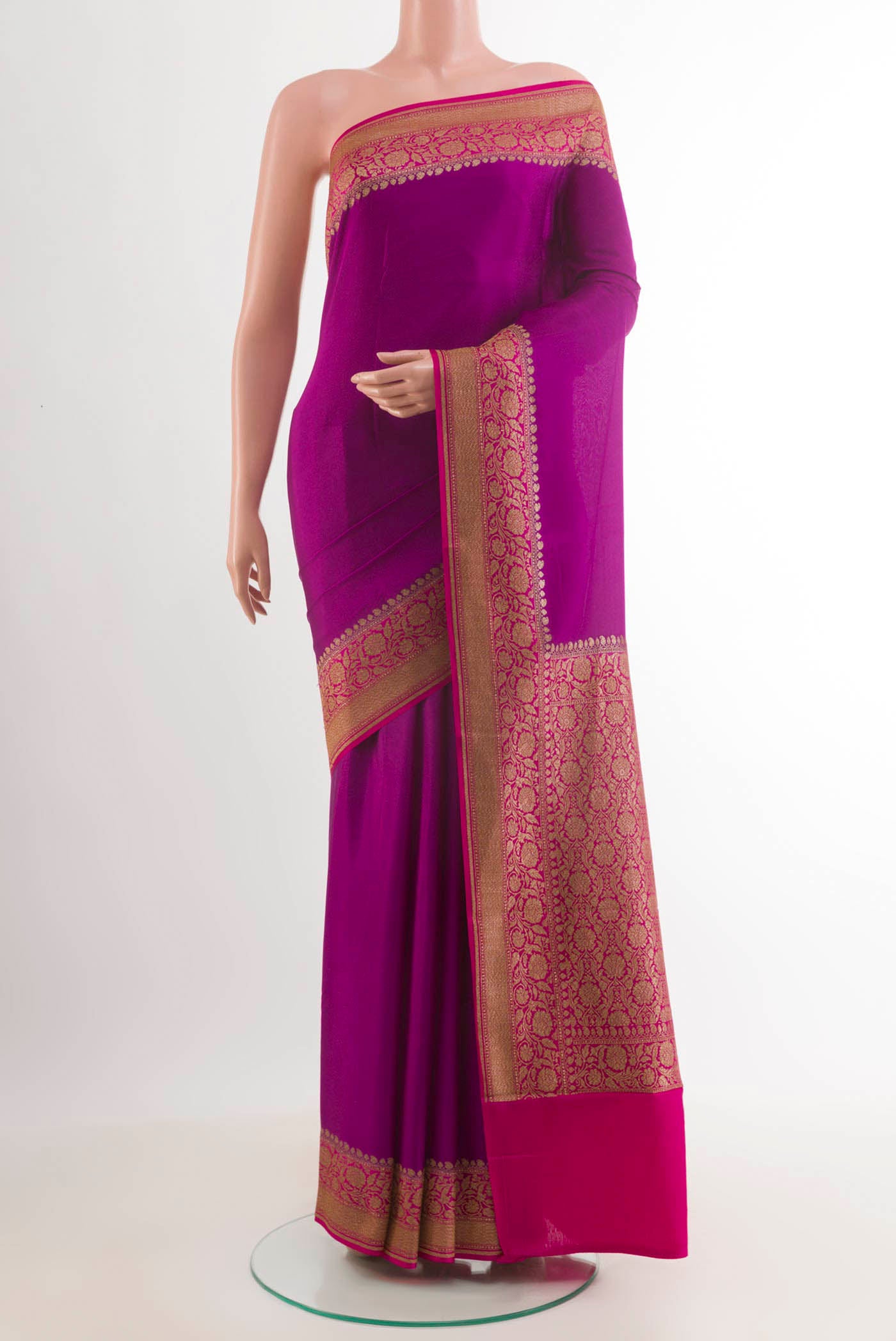 Purple Banarasi Georgette Saree with Plain Body and Zari Border.  displayed on a mannequin