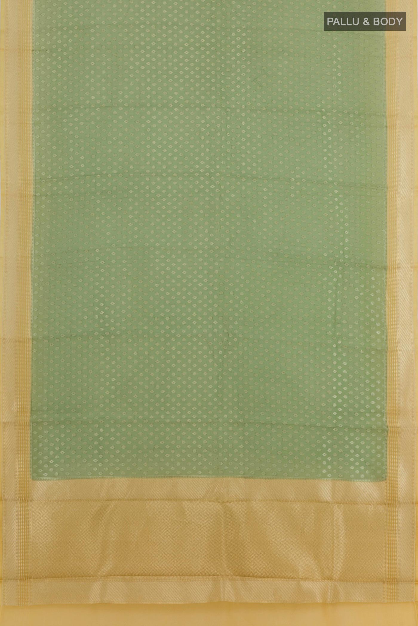 Flat view of Green Banarasi Kora Silk Saree with Zari Butta on the body and Zari Border. 