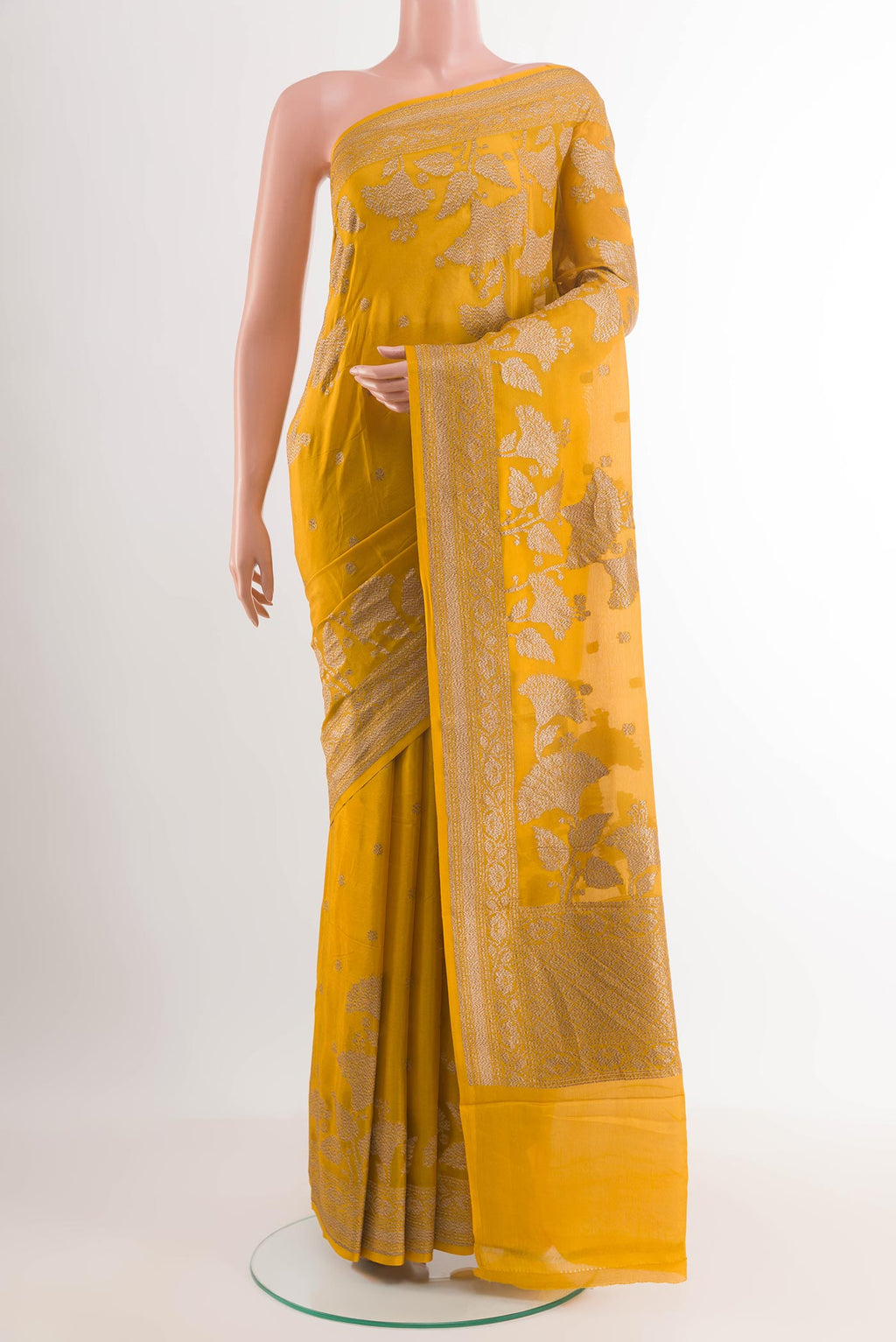 Yellow Banarasi Georgette Saree with Zari Butta on the body and Plain Border.  displayed on a mannequin
