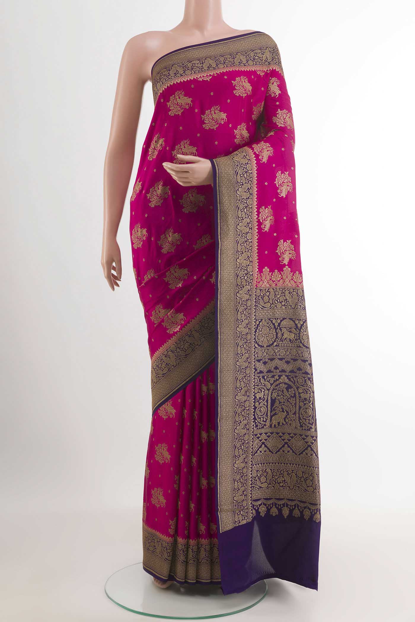 Pink Mysore Crepe Saree with Zari Butta on the body and Zari Border.  displayed on a mannequin