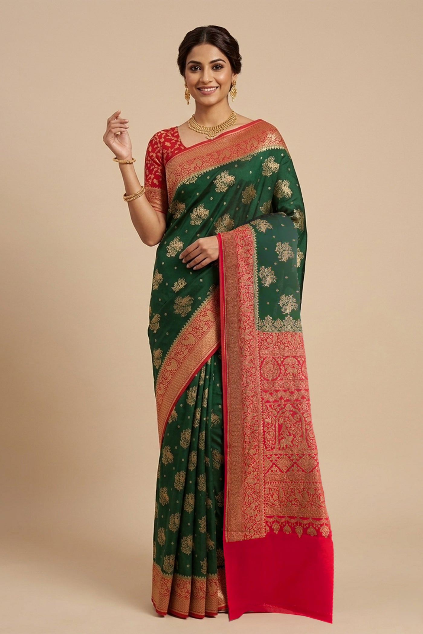 Model wearing a Bottle Green Banarasi Georgette Saree with Zari Butta on the body and Zari Border.