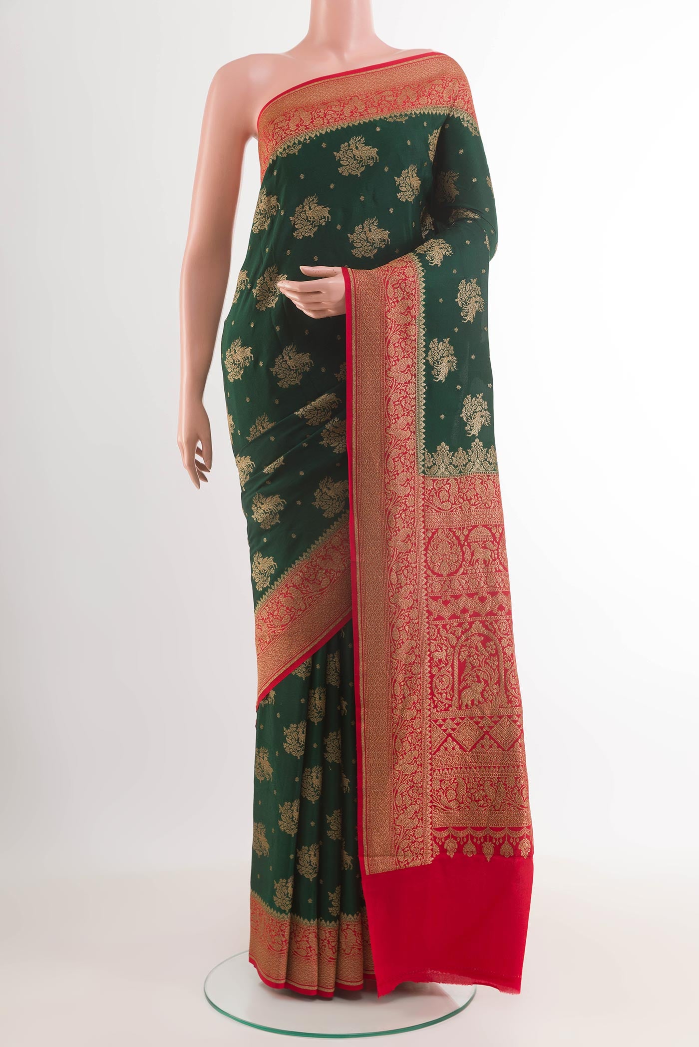 Green Banarasi Georgette Saree with Zari Butta on the body and Plain Border.  displayed on a mannequin