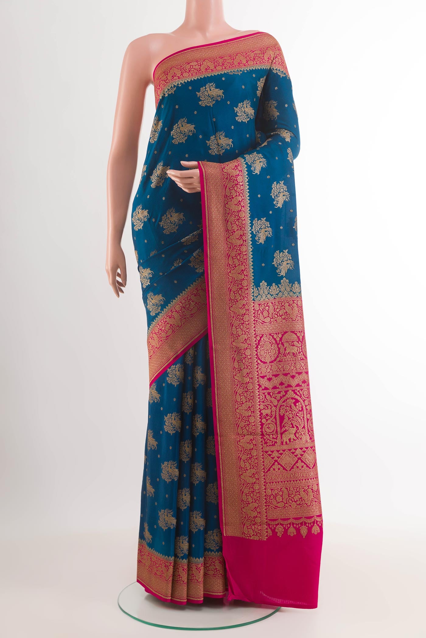 Blue Banarasi Georgette Saree with Zari Butta on the body and Plain Border.  displayed on a mannequin