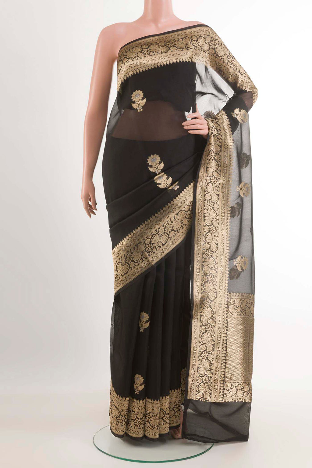 Black Banarasi Kora Silk Saree with Zari Butta on the body and Zari Border.  displayed on a mannequin