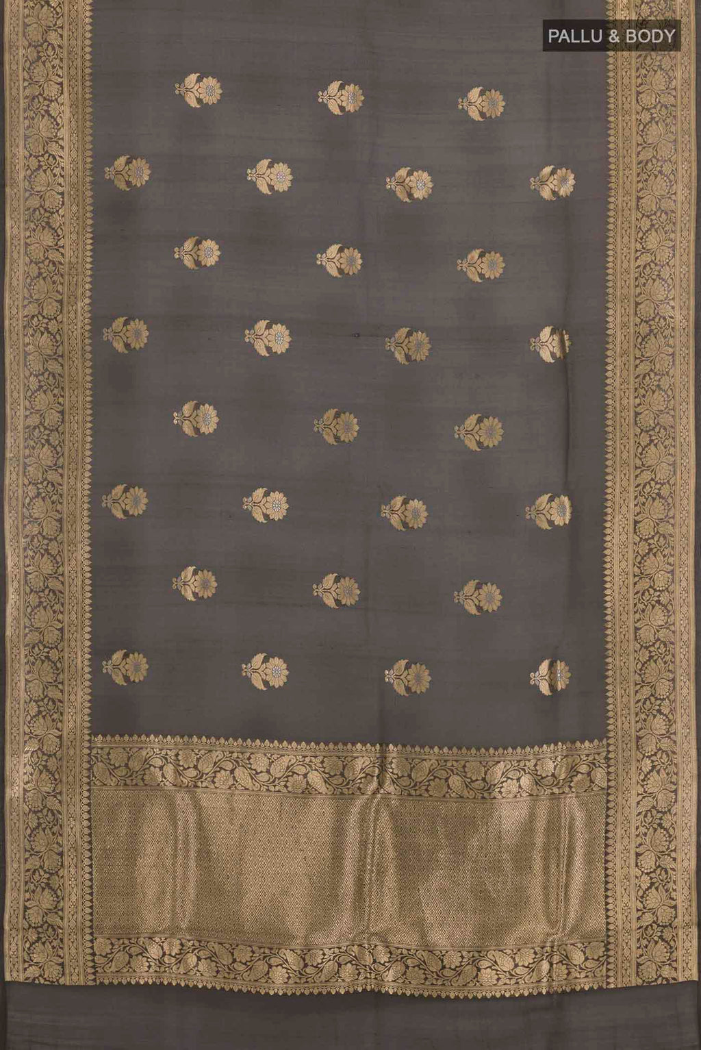 Flat view of Black Banarasi Kora Silk Saree with Zari Butta on the body and Zari Border. 