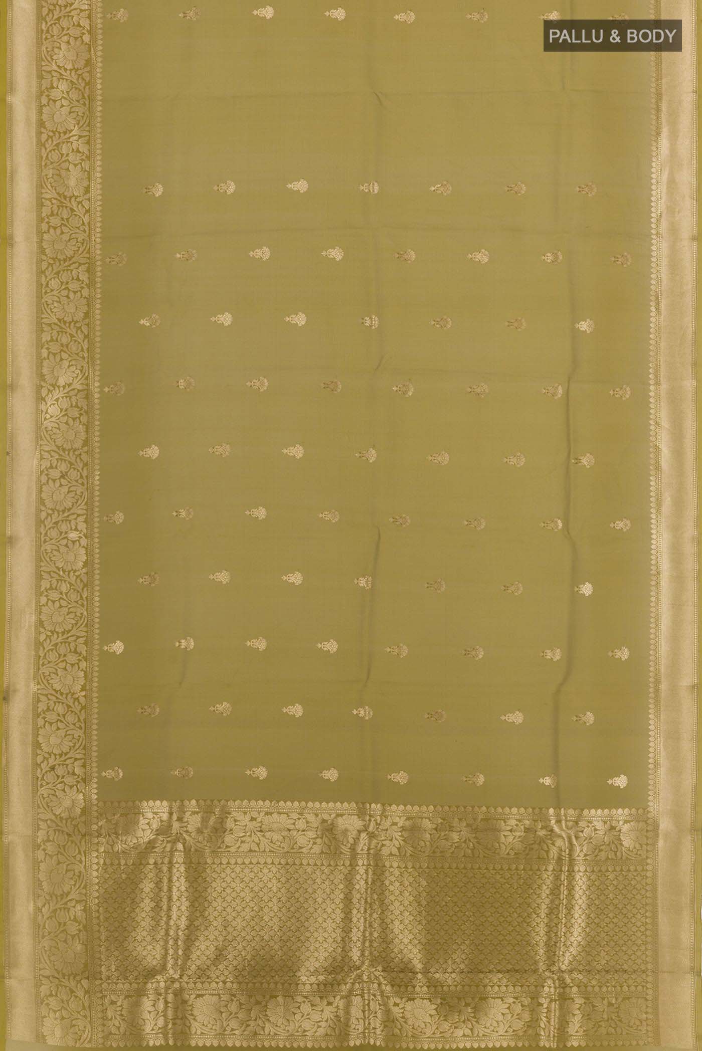 Flat view of Mehandi Green Banarasi Kora Silk Saree with Zari Butta on the body and Zari Border. 