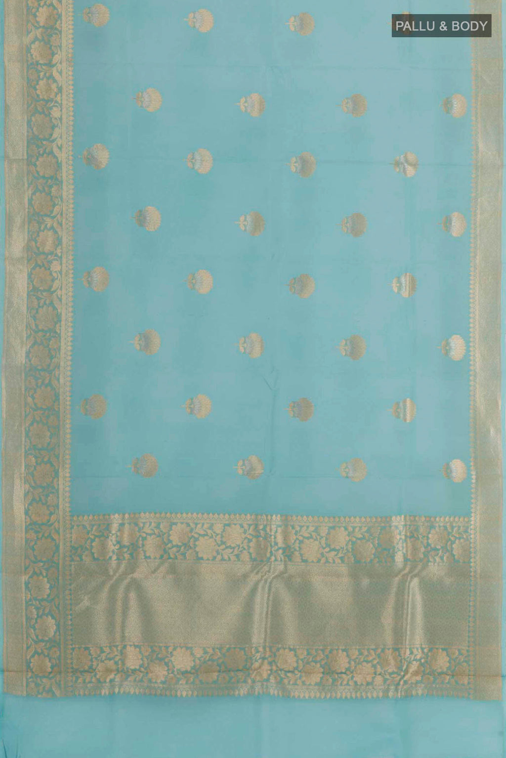 Flat view of Sky Blue Banarasi Kora Silk Saree with Zari Butta on the body and Zari Border. 
