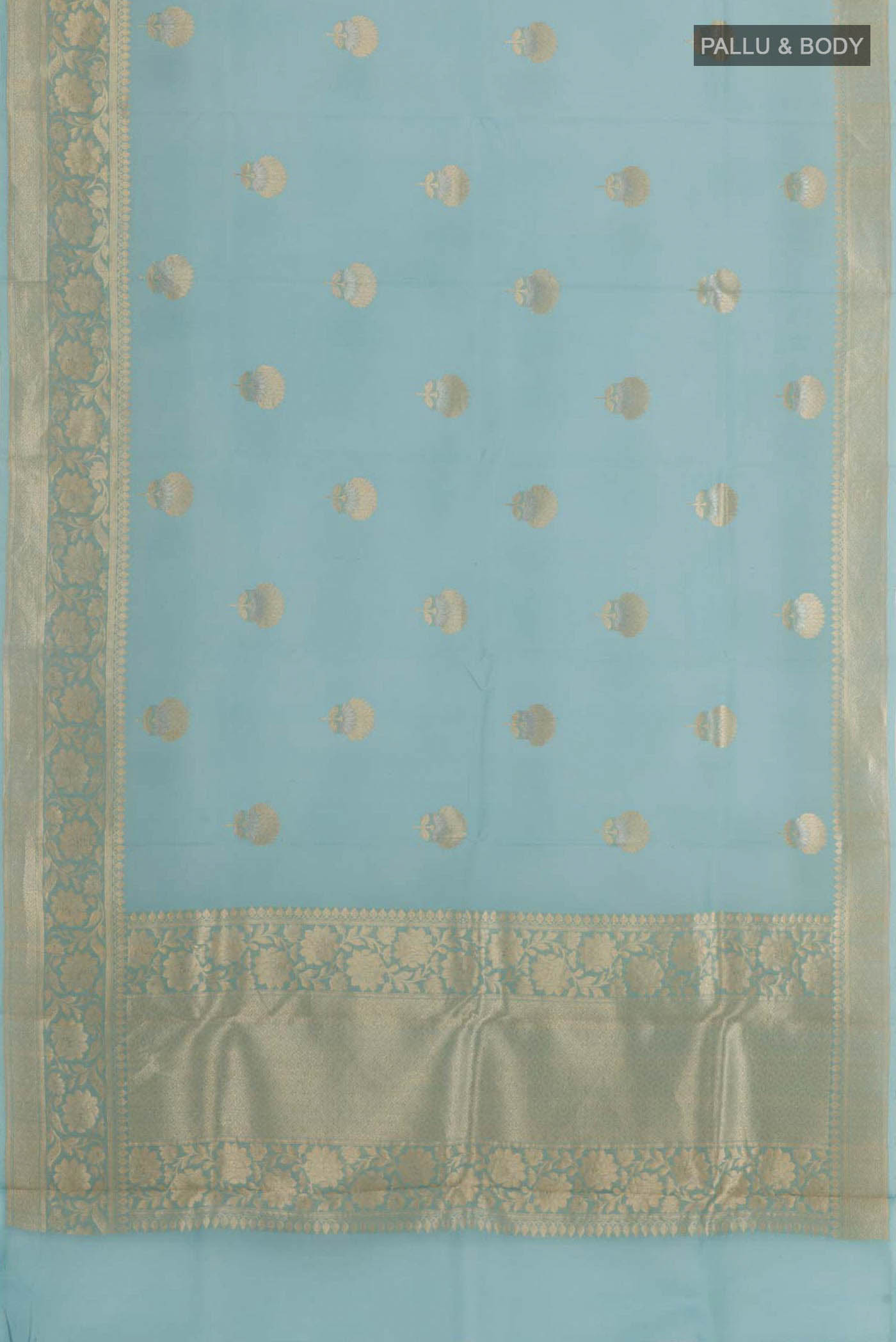 Flat view of Sky Blue Banarasi Kora Silk Saree with Zari Butta on the body and Zari Border. 