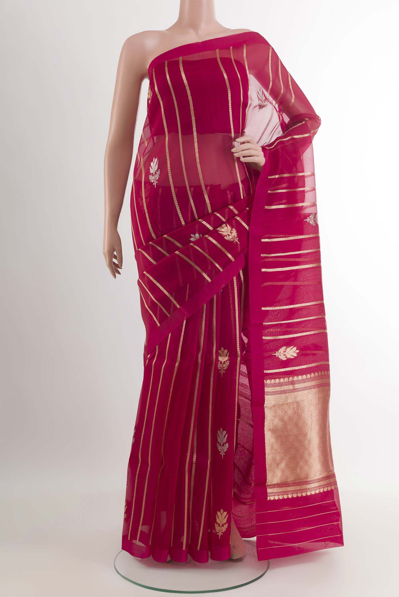 Red Banarasi Kora Silk Saree with Stripes on the body and Plain Border.  displayed on a mannequin